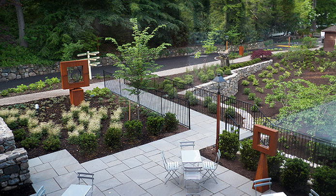 The Contemporary Gardens in Spring with a small bluestone patio