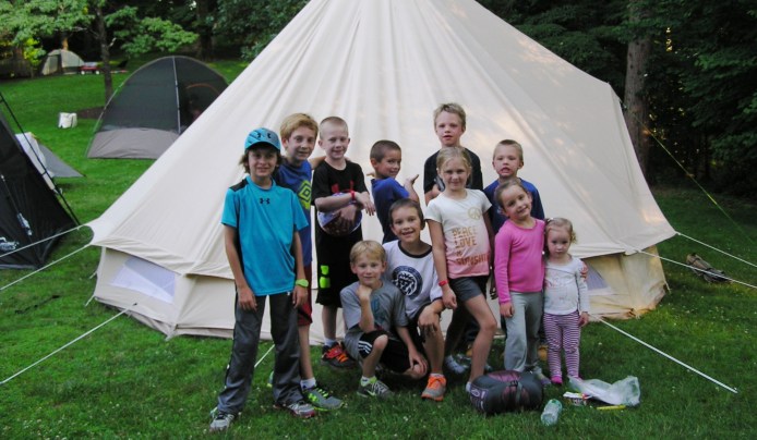 Children in front of a tent