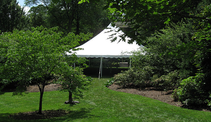 Host a corporate event in the azalea gardens with a tent