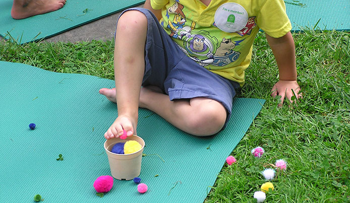 Kids and families playing lawn games