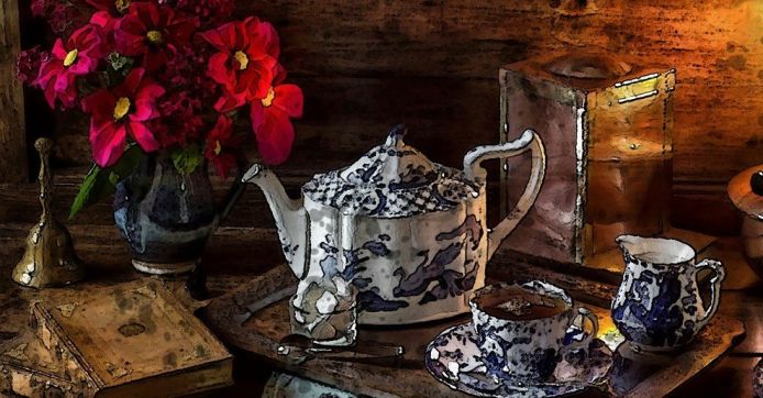 Teaware with a book and flowers