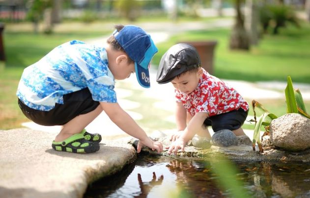 Little boys at a pond