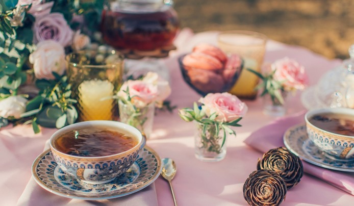 Sunday Afternoon Tea with filled cups and flowers