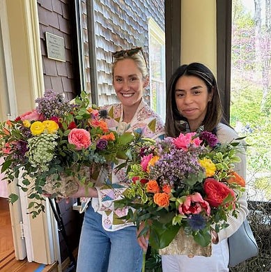 flowers and 2 women